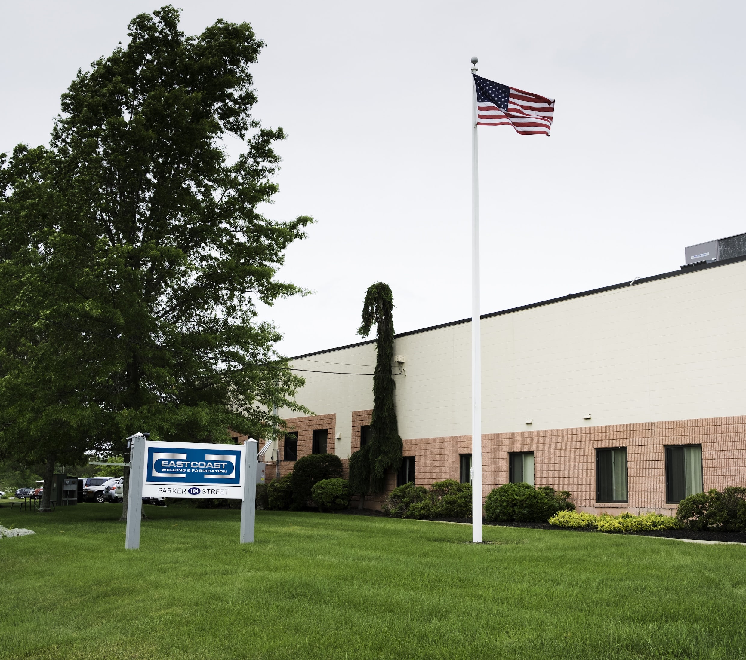 East Coast Welding & Fabrication sign in front of facility